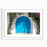 Abstract art print of a Tunisian landscape in muted earth tones on a framed white mat, ideal for dining room decor.