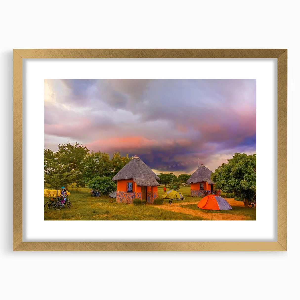 Extra large abstract art print depicting a textured African landscape in earth tones, framed in gold.