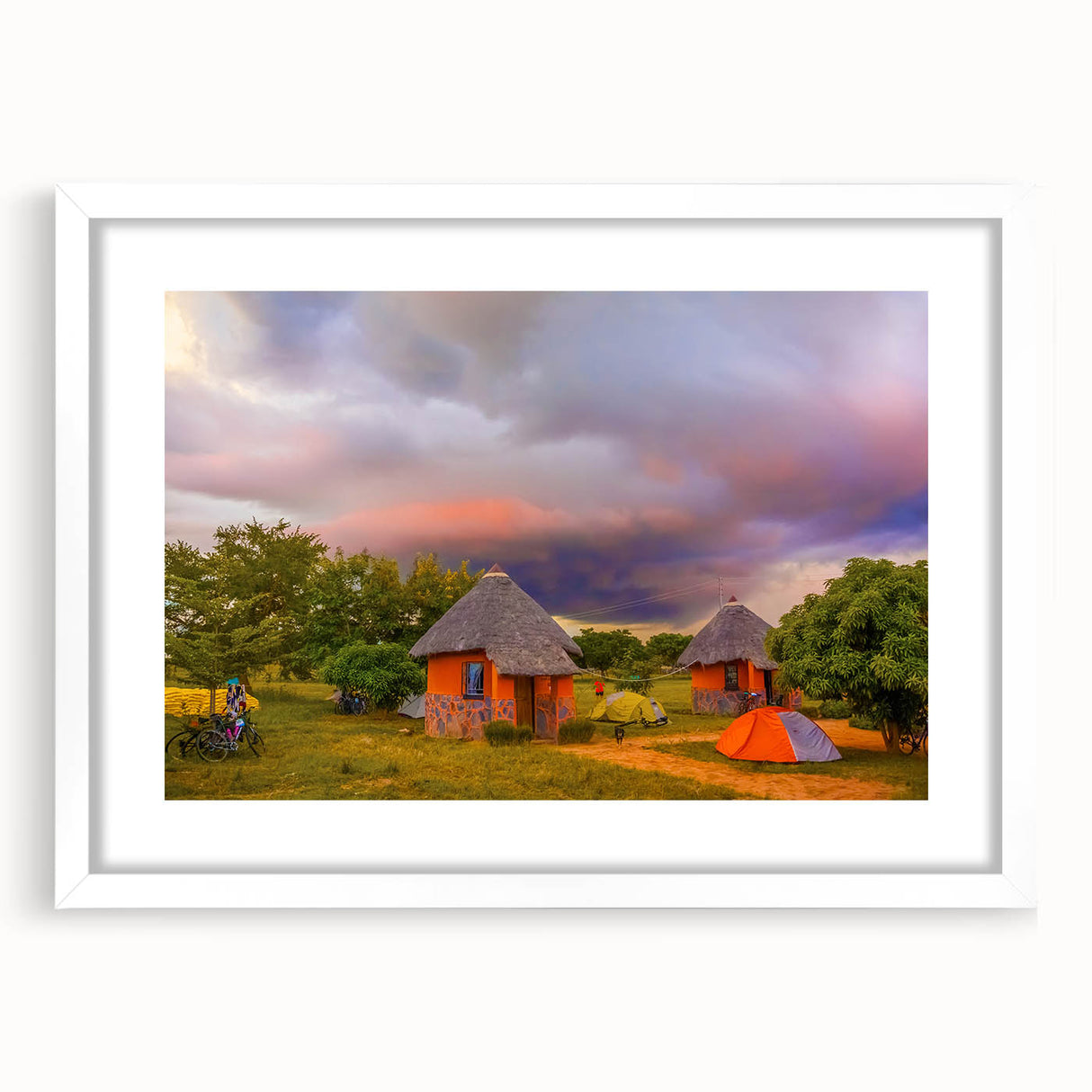 Abstract art print depicting a serene Zambian landscape in soft earth tones on a framed white mat.