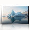 Large abstract wall art of an Antarctic landscape in muted gray and blue tones, framed in black acrylic.