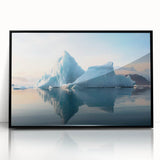 Large abstract wall art of an Antarctic landscape in muted gray and blue tones, framed in black acrylic.