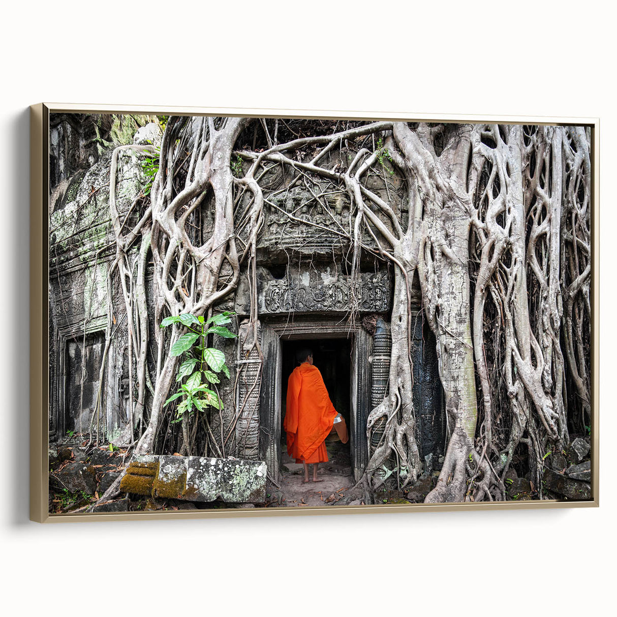 Framed canvas featuring a vintage-style landscape of a Cambodian scenery in muted gold and black tones.