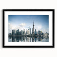 Colorful abstract art print of Shanghai skyline, featuring vibrant hues on a large framed canvas.