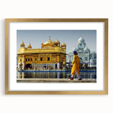 Extra large framed abstract art print featuring a textured depiction of an Indian scenery in gold and earth tones.
