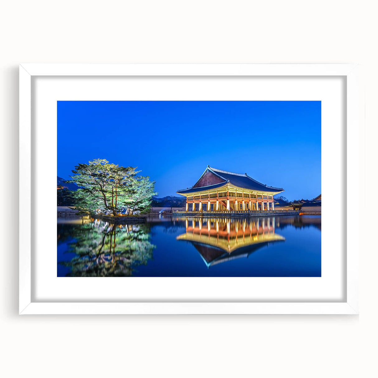 Abstract art print of Seoul skyline in muted gray and blue tones on a framed white mat, ideal for dining room decor.