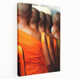 Side view of a stretched canvas depicting a serene Laos landscape in muted earth tones, ideal for kitchen wall art.
