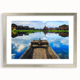 Textured art depicting an abstract scenery of Myanmar in muted earth tones on a framed silver mat, ideal for bedroom art.