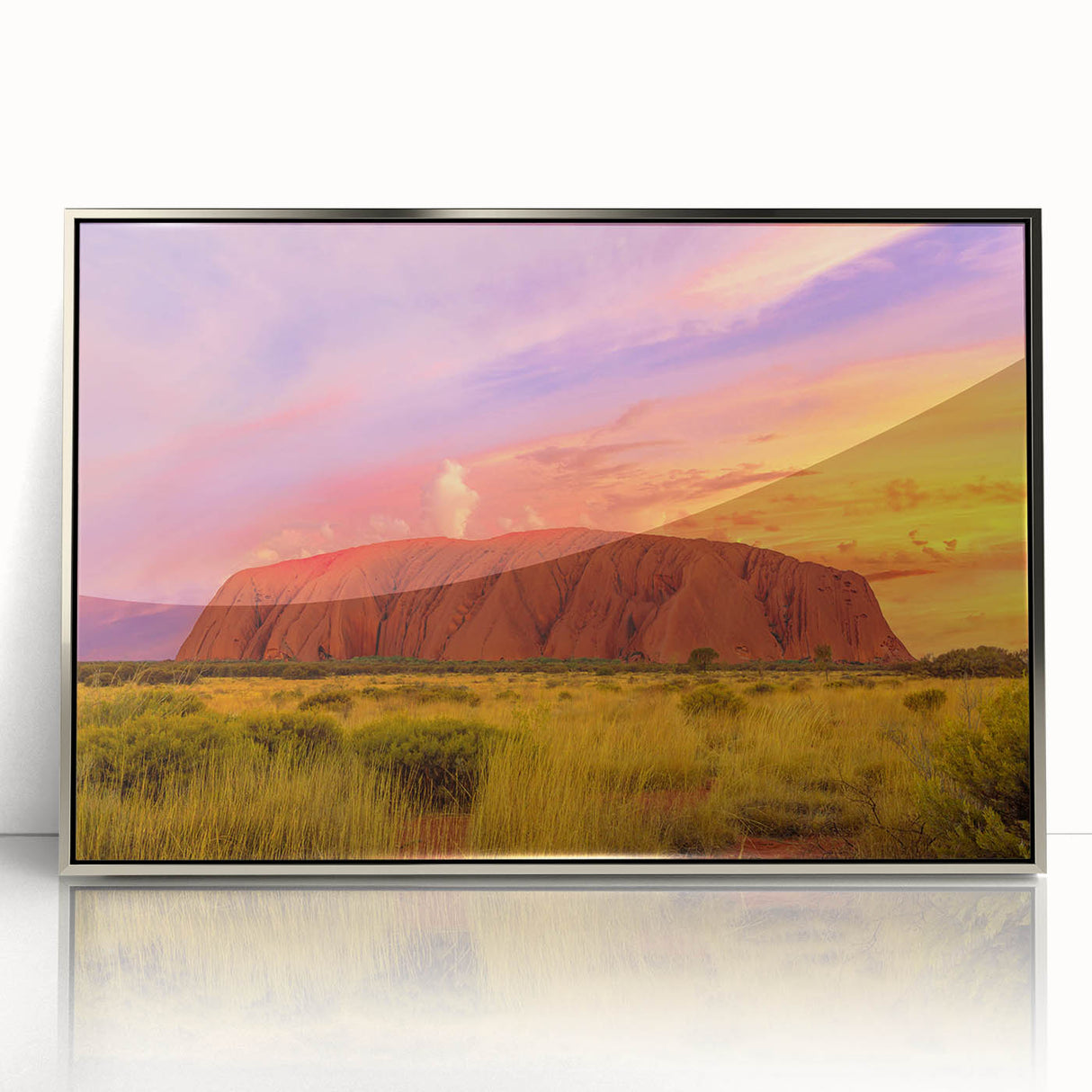 Framed acrylic print of Ayers Rock in Australia, depicted in earthy red and orange tones, ideal for modern art wall decor.