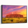 Black and white framed canvas of Ayers Rock landscape, ideal for bedroom wall decor.