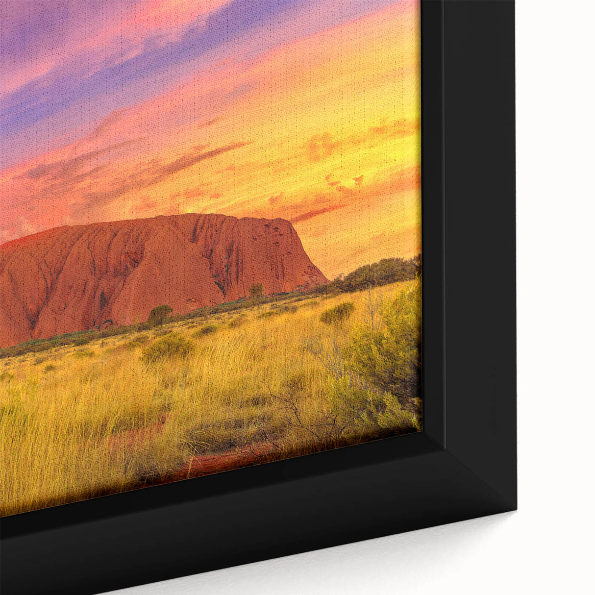 Extra large framed canvas of Ayers Rock in Australia, featuring textured black and colorful art, ideal for living room decor.