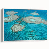 Framed canvas wall art featuring a vibrant depiction of the Great Barrier Reef, ideal for bedroom decor.