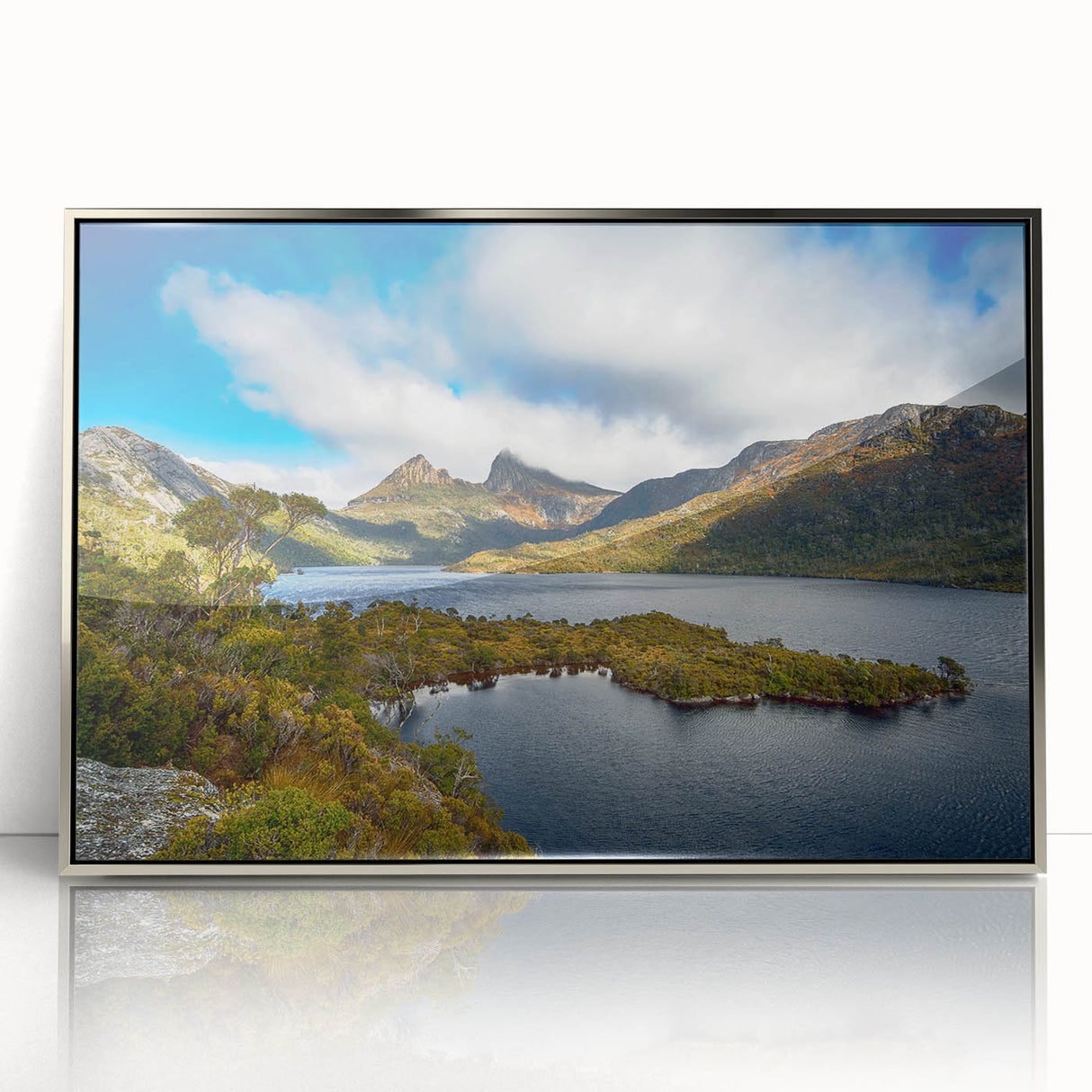 Art deco poster of Tasmania scenery in silver framed acrylic, featuring muted earth tones, ideal for modern art wall decor.