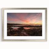 Textured abstract art print of New Brunswick scenery in muted earth tones, framed in silver, ideal for bedroom art.