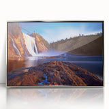 Mid-century modernist art depicting Quebec scenery in cool blue tones on a silver-framed acrylic print.