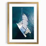 Textured art print of an abstract Caribbean seascape in vibrant blue and green hues on a framed canvas.