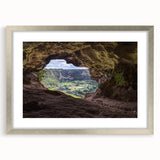 Extra large abstract art print featuring textured Caribbean scenery in muted blue and green tones, framed in silver.