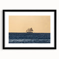 Extra large abstract art print featuring a vibrant, textured depiction of a Caribbean scenery on a black framed canvas.