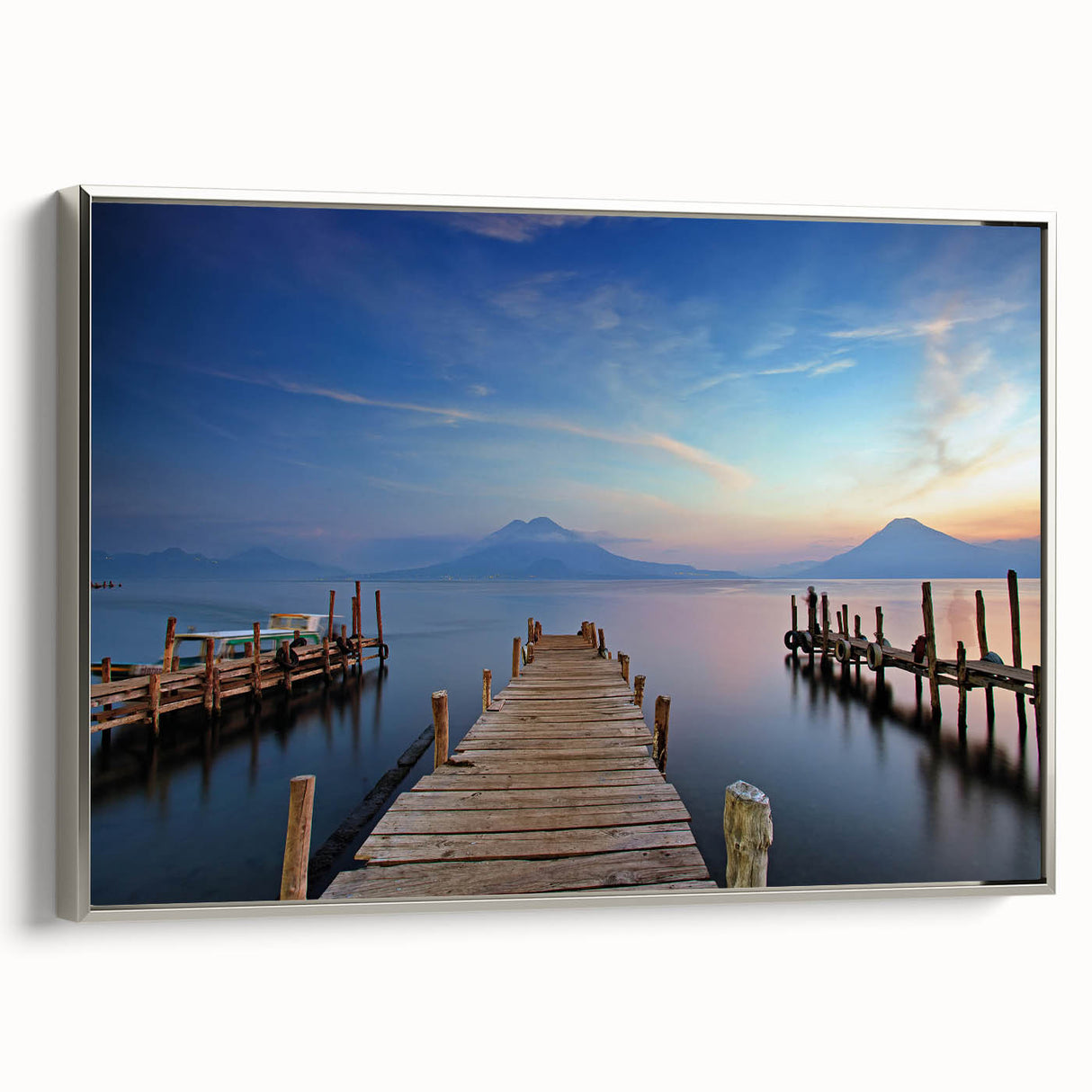 Framed canvas of a vintage-style landscape painting featuring a colorful Guatemalan rural scene.