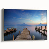 Framed canvas of a vintage-style landscape painting featuring a colorful Guatemalan rural scene.