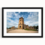Extra large abstract art print of a colorful Central American scenery on a textured canvas, framed in black.