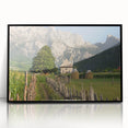 Large abstract wall art of an Albanian landscape in muted earth tones, framed in black acrylic.