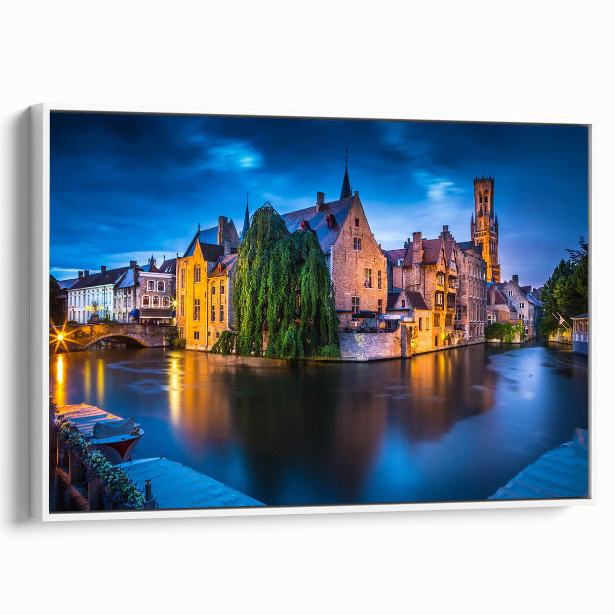Framed canvas of a vintage European landscape painting, featuring vibrant colors on a black background.