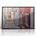 Large abstract wall art depicting a Croatian landscape in muted earth tones, framed in black acrylic.
