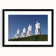Extra large abstract art print featuring a colorful, textured depiction of a European scenery on a black framed canvas.