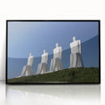 Large abstract wall art depicting a Danish landscape in muted green and blue tones, framed in black acrylic.