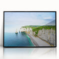 Large abstract wall art depicting the Normandy coast in muted blues and grays, framed in black acrylic.