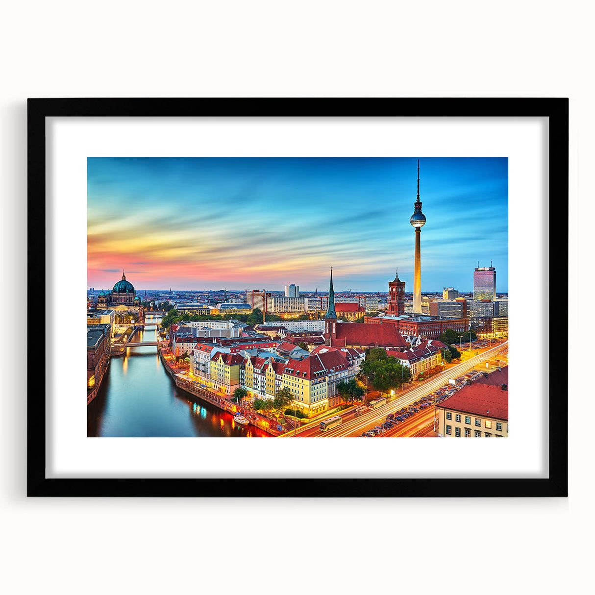 Abstract art print of a colorful European scenery in muted pastels on a textured, extra-large canvas, framed in black.