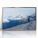 Large art print of a mid-century modernist Greenland scenery in muted green tones, framed in silver acrylic.