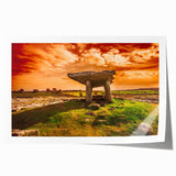 Rolled print of an Irish landscape featuring green fields and a distant castle, in muted earth tones.
