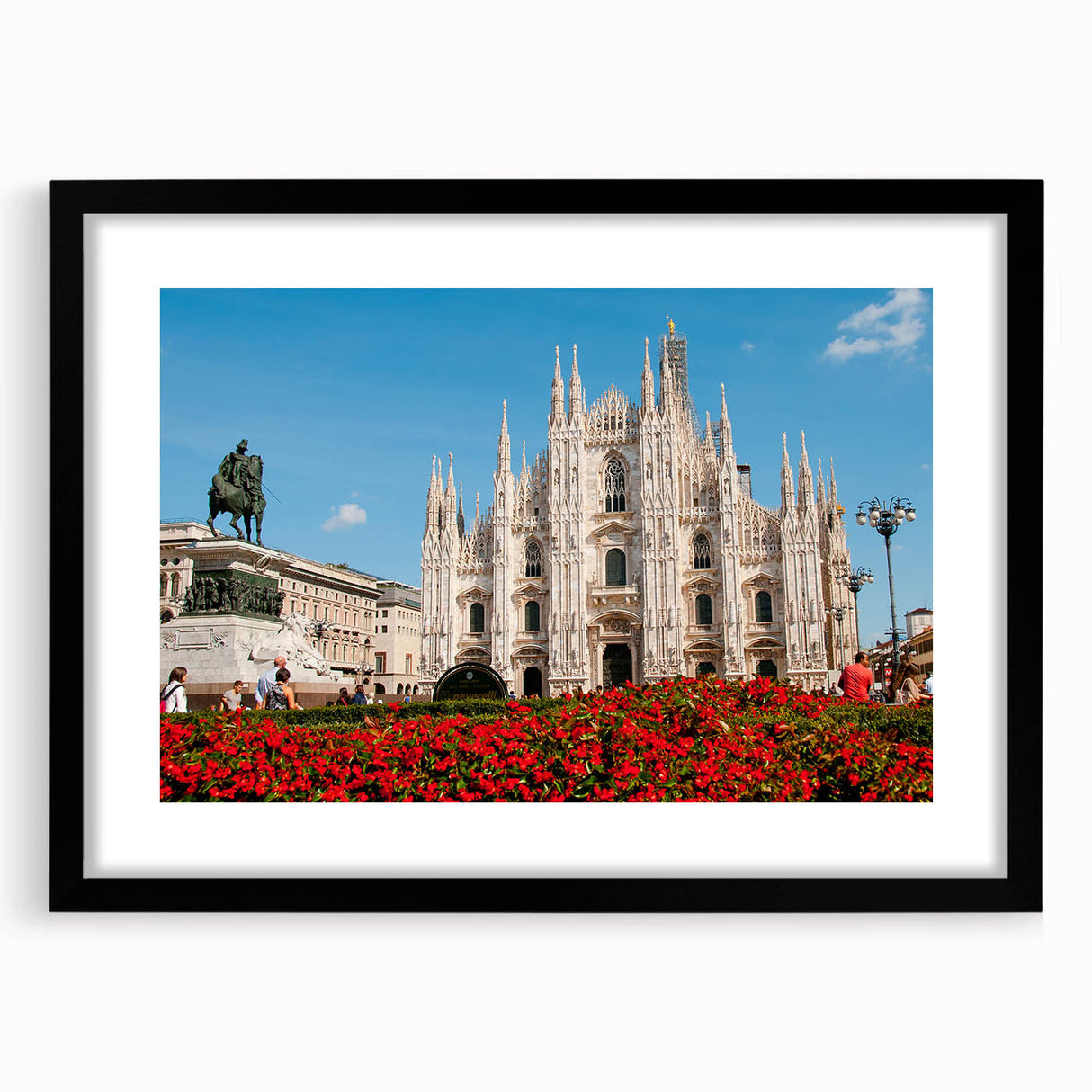 Abstract art print of Milan scenery in vibrant, colorful hues on a large textured canvas, framed in black.