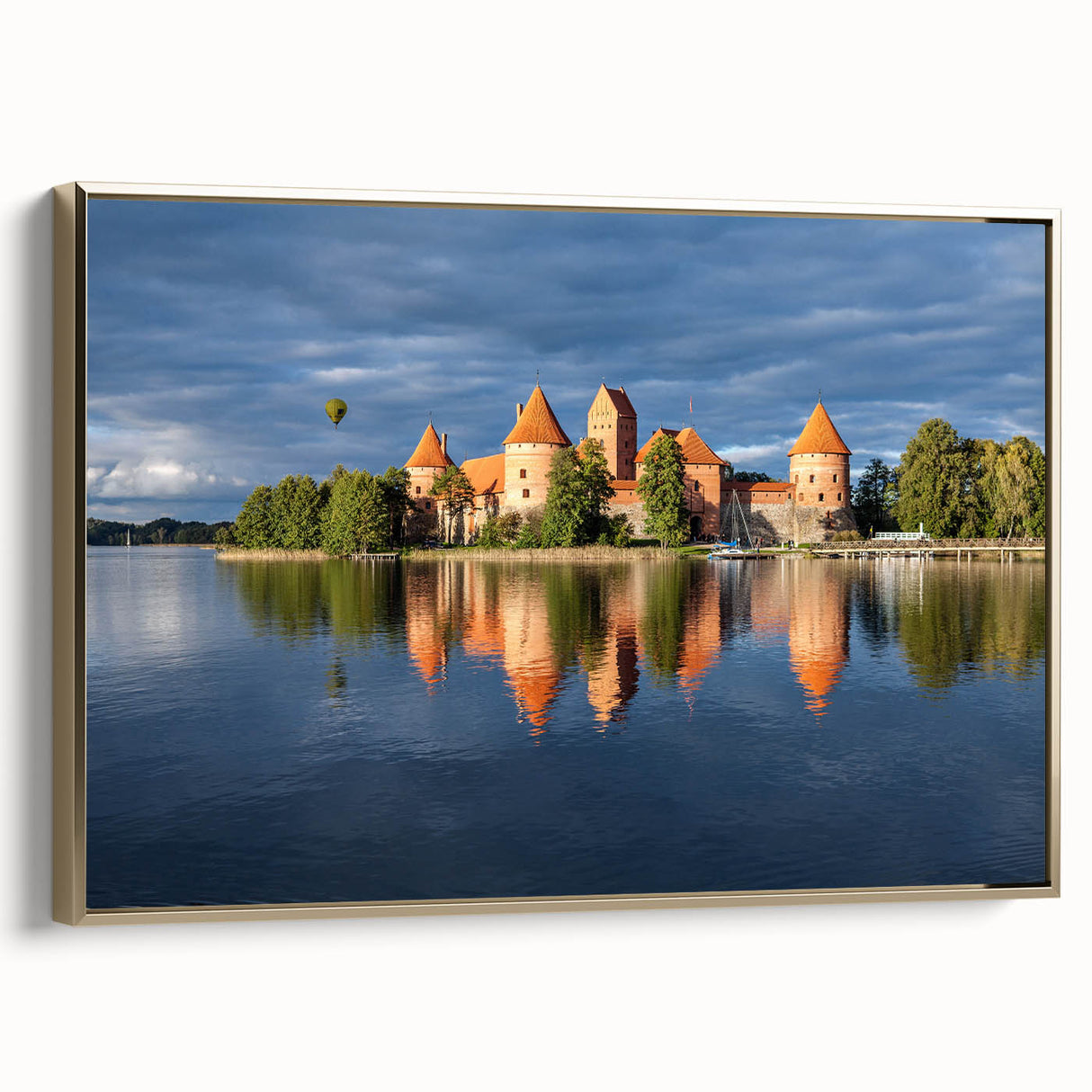 Framed canvas featuring a vintage-style landscape painting of a Lithuanian scenery in muted earth tones.