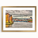 Abstract art print of Northern Ireland scenery in muted green and blue tones, framed with a gold mat.