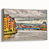 Framed canvas depicting a vintage landscape painting of Northern Ireland, featuring muted greens and blues.