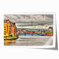 Rolled print depicting a serene Northern Ireland landscape with lush greenery and soft sky hues.