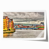 Rolled print depicting a serene Northern Ireland landscape with lush greenery and soft sky hues.