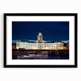 Abstract art print of a colorful, textured European cityscape on a large framed canvas, ideal for living room decor.