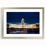 Extra large abstract art print of a textured European cityscape in muted gray and silver tones, framed with a silver mat.