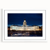 Textured abstract art print of a muted blue and gray Petersburg scenery, framed with a white mat, suitable for bedroom art.