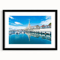 Colorful abstract art print depicting a vibrant, textured European scenery on a large framed canvas.