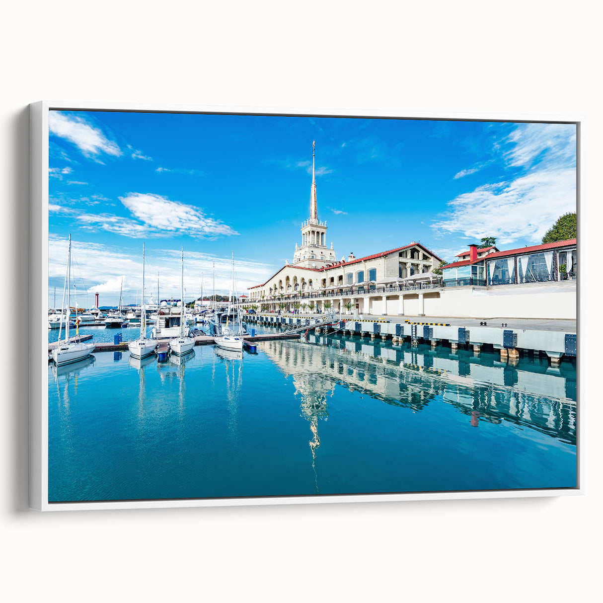 Vintage poster art of Sochi scenery on a framed canvas, featuring colorful art with black accents.
