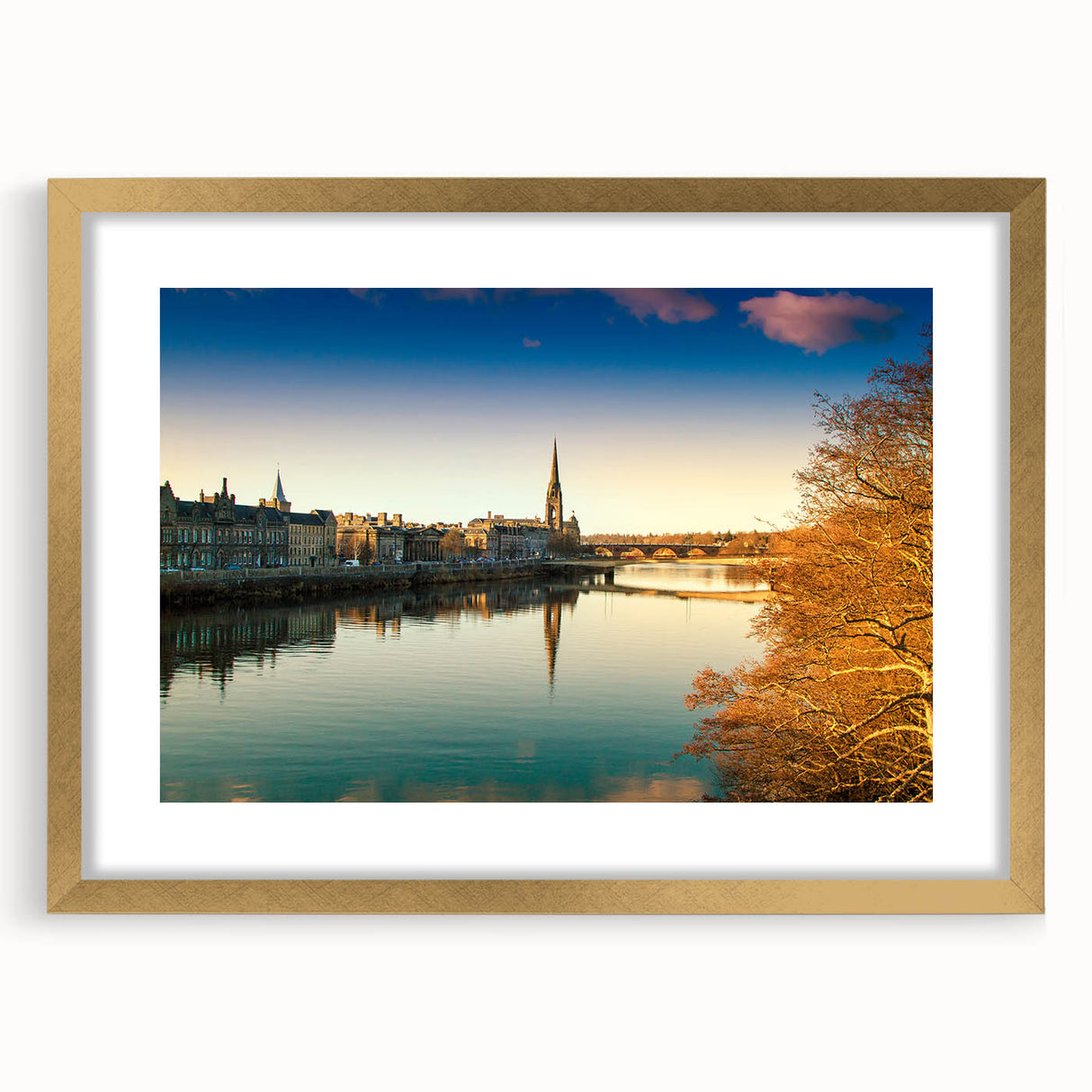 Abstract art print of a European landscape in muted greens and blues, framed in gold, suitable for dining room decor.