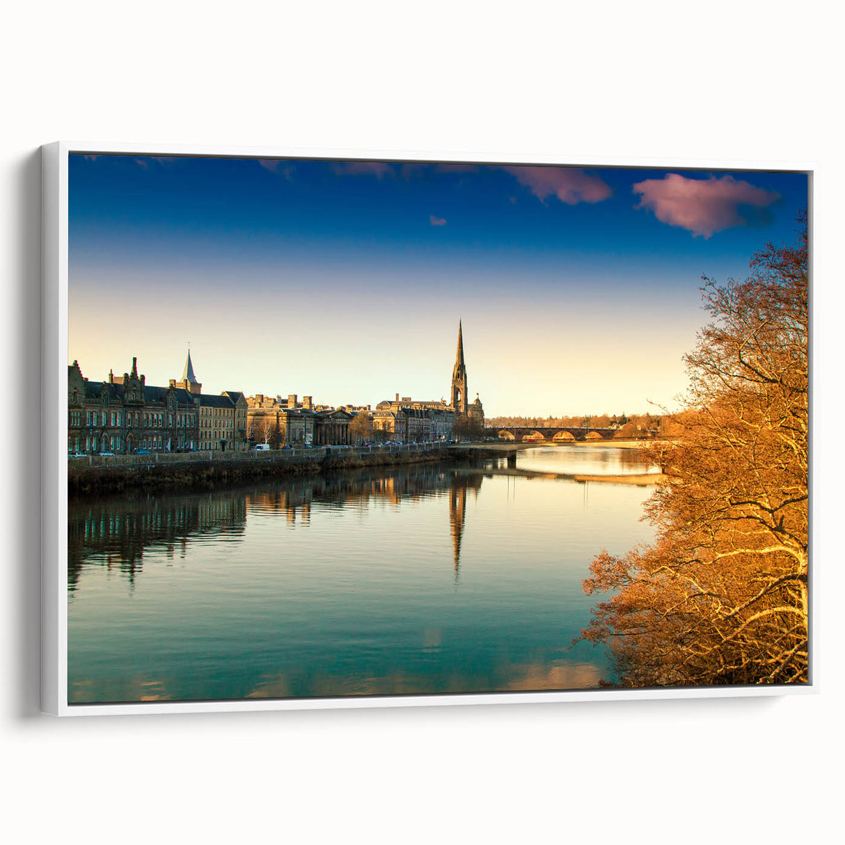 Vintage poster art of a Scottish landscape on a framed canvas, featuring vibrant green and blue tones.