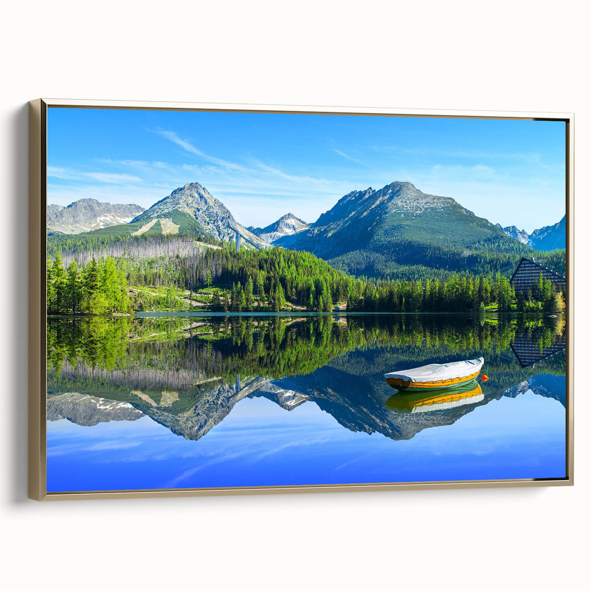 Framed canvas wall art depicting a vintage European landscape in muted gold and black tones, ideal for bedroom decor.