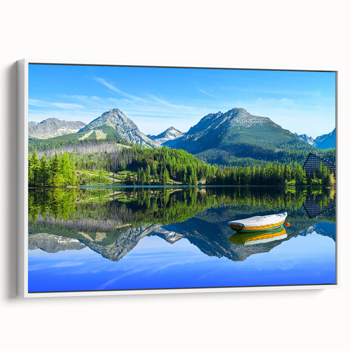 Vintage poster art of a European scenery on framed canvas, combining colorful art with black accents.