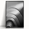 Large abstract wall art depicting a stylized Barcelona cityscape in muted gray tones on a framed acrylic.