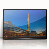 Large abstract wall art featuring a stylized Stockholm scenery in muted gray and blue, framed in black acrylic.